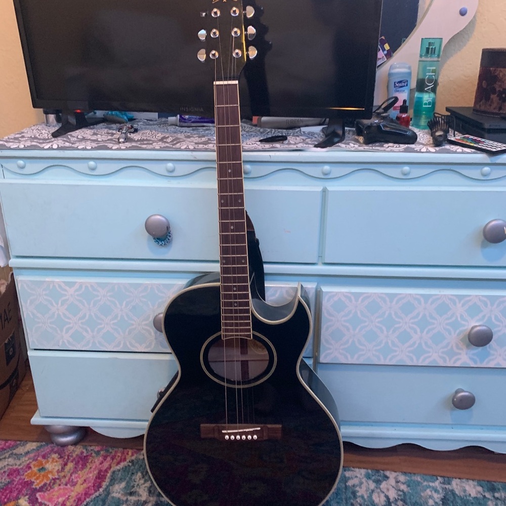 Black acoustic guitar